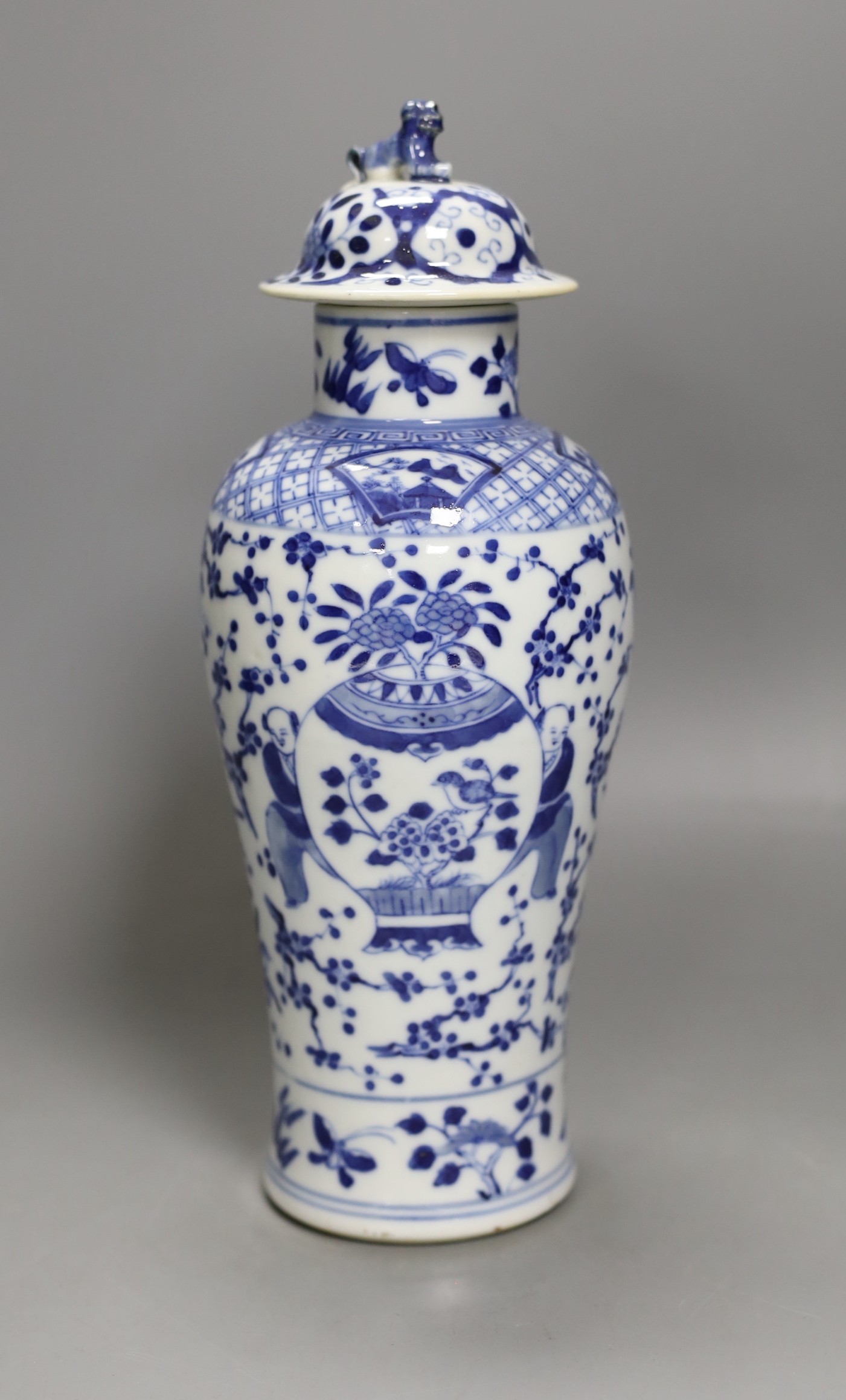 A 19th century Chinese blue and white 'boys and jar' vase and cover 28cm